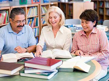 Adult students visitors in library